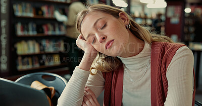 Buy stock photo College student, laptop and girl with sleeping in library for study fatigue, burnout or low energy. Education, tired and person with nap on campus for academic exhaustion and overworked from workload