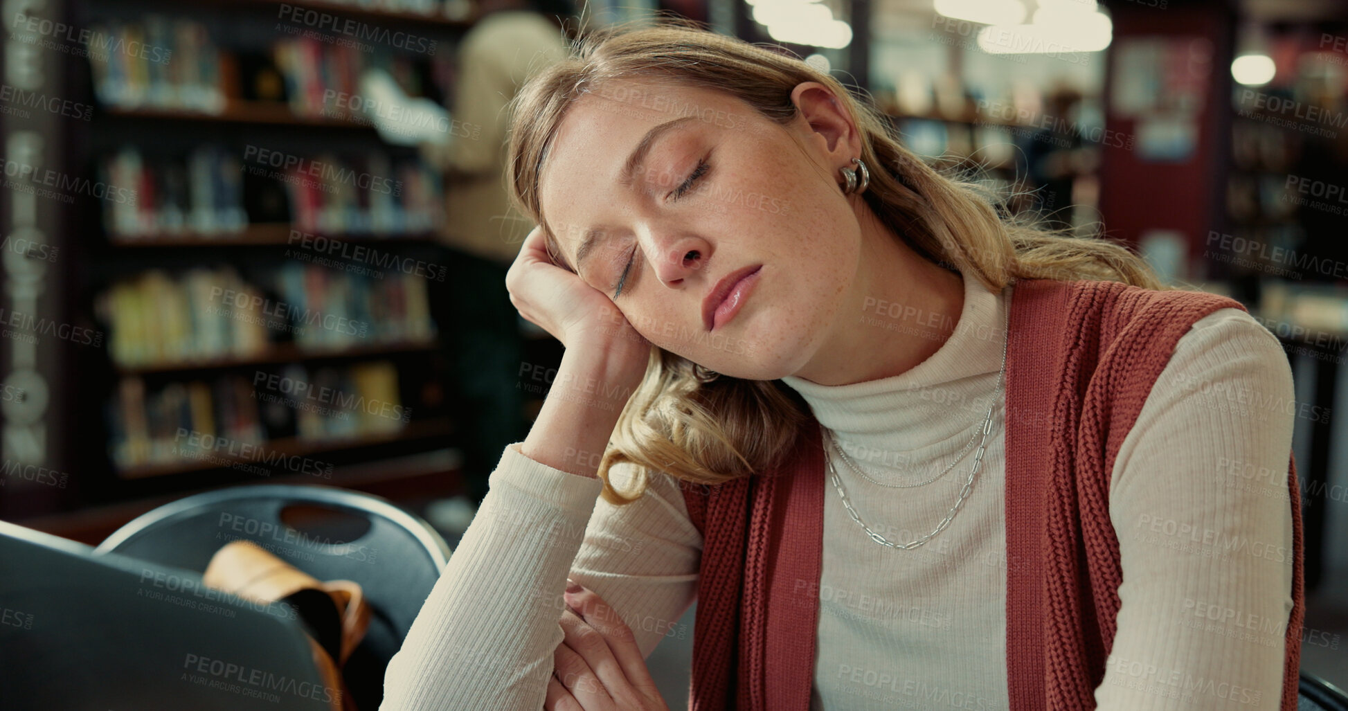 Buy stock photo College student, laptop and girl with sleeping in library for study fatigue, burnout or low energy. Education, tired and person with nap on campus for academic exhaustion and overworked from workload