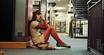 Student, university or girl with stress in library for learning pressure, test fail or overwhelmed. Frustrated, campus and person with depression on floor for academic expectations and workload panic