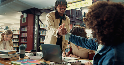 Buy stock photo Group, handshake and students or friends in library for education, welcome and college. Assignment resources, greeting and study habits with people on campus for school scholarship and hello
