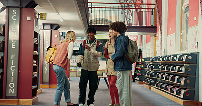 Buy stock photo Happy friends, students and laughing in library for funny joke, humor or comedy at school. Study group, people or learners with smile for social comic, learning or education at university or campus