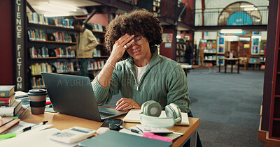 Buy stock photo College student, man and laptop with headache in library for exam stress, burnout or overworked. Education, person and migraine on campus for academic pressure, course workload or assignment deadline