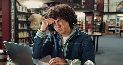 Buy stock photo Stress, man and student with headache in library for exam pressure, study fatigue and pain. University, sick and tired person with migraine, burnout and brain fog with thesis deadline on laptop