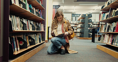 Buy stock photo Student, books and research with woman in library for reading, assignment and college thesis. University, scholarship and education with person and bookshelf for project information and studying