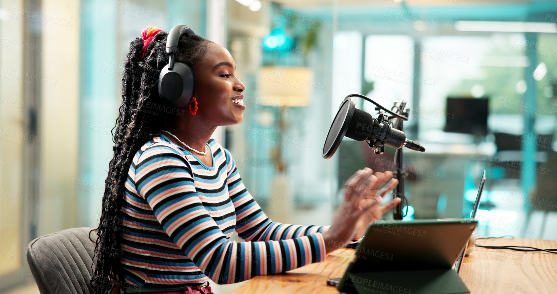 Buy stock photo Talking, headphones and black woman on podcast with microphone for broadcast or radio host. Laptop, happy person and live streaming in studio for show, production or content creation for social media