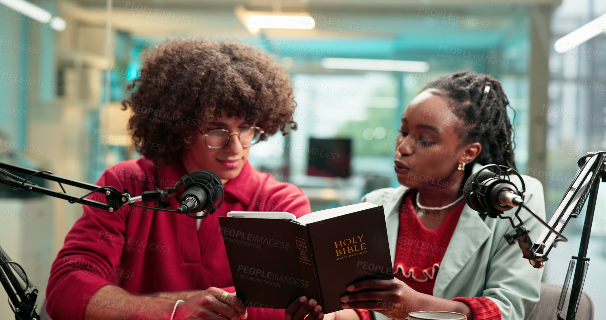 Buy stock photo Bible, microphone and radio with people in recording studio for religious study or streaming. Book, podcast and reading with Christian influencer team on talk show for belief, faith or religion