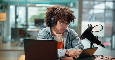 Buy stock photo Man, tablet and headphones with mic for broadcast, recording podcast and live streaming. Male person, equipment and laptop for news announcement, radio channel and hosting talk show for entertainment