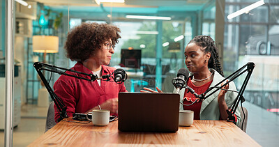 Buy stock photo Podcast, man and woman with mic by laptop for live streaming, broadcast or host. People, guest and interview for online platform, web presenter and studio for radio or talk show with tech