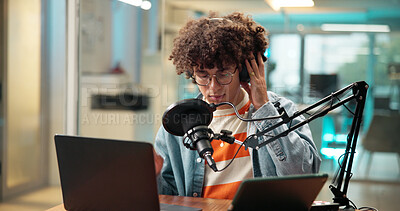 Buy stock photo Man, presenter and headphones with mic for broadcast, recording podcast and sound check. Male person, equipment and laptop for news announcement, radio channel and hosting talk show for entertainment