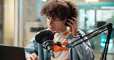 Buy stock photo Man, laptop and headphones with mic for broadcast, recording podcast and sound check in studio. Male person, equipment and audio of news announcement, radio channel and hosting show for entertainment