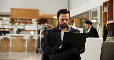 Buy stock photo Man, laptop and typing in hotel lobby with travel, review and report for financial on business trip. Person, computer and relax in waiting room for accommodation, hospitality and contact at lodge