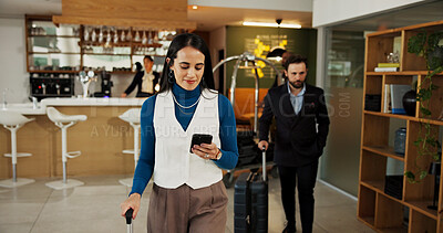 Buy stock photo Hotel, smartphone and woman in lobby, internet and confidence with travel business, luggage and app. Person, entrepreneur and guest in hallway, hospitality and cellphone with connection and texting