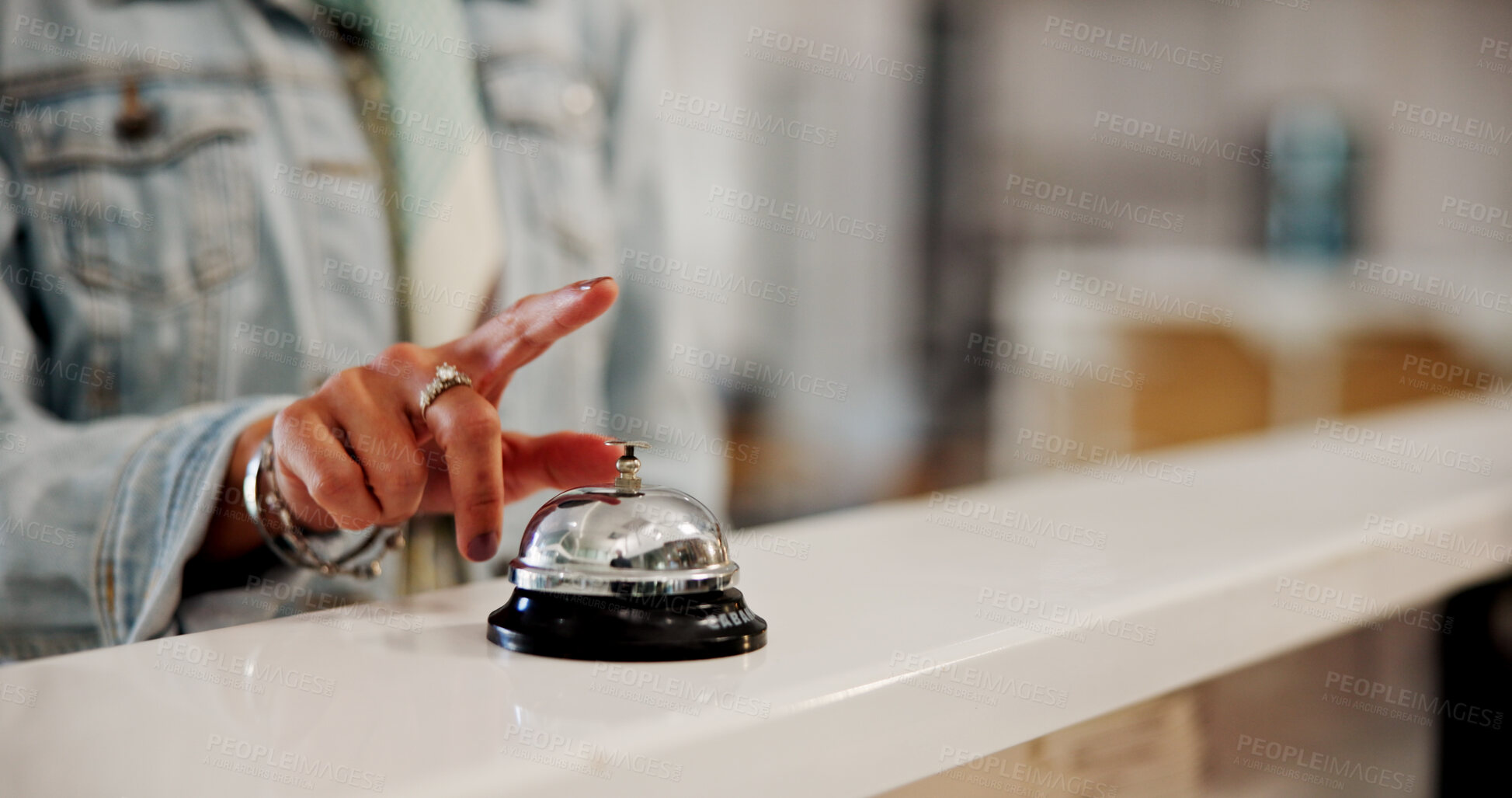 Buy stock photo Person, hands and ring with bell for service, alert or attention at hotel front desk. Customer, finger and ringer with alarm, request or calling concierge for accommodation, hospitality or assistance