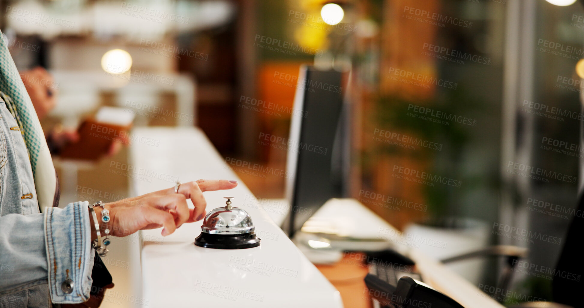 Buy stock photo Person, hands or ring with bell at hotel for room service, alert or attention at front desk. Customer, finger or buzzer with alarm, request or calling concierge for accommodation, hospitality or help
