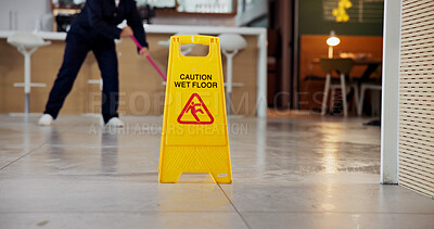 Buy stock photo Cleaning, business and caution for wet floor, warning and person with equipment for service or sign. Board, information and notice for safety, disinfection and routine for sanitation of coffee shop
