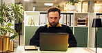 Man, laptop and night at startup, research and typing for report, project and deadline in office. Person, editor and computer with reading, feedback or review process with overtime at creative agency