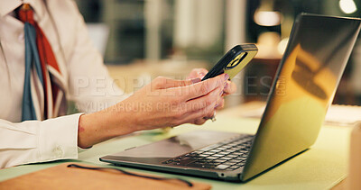 Buy stock photo Business, hands and woman with phone by laptop at night for text message, notifications or chat. Office, working late and employee with smartphone for online research, internet browsing or networking