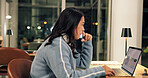 Thinking, laptop and business woman in office at night for online article, research and copywriting. Creative, media agency and person with ideas on computer for editing report, planning and review