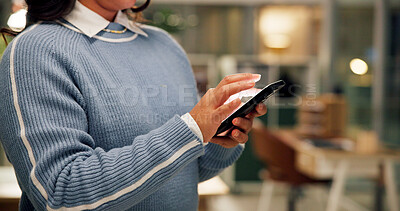 Buy stock photo Hands, cellphone and businesswoman in office at night with communication for overtime on creative project. Networking, phone and magazine editor with mobile app for contact with publishing deadline.