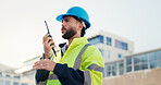 Man, engineer and explain on radio outdoor for discussion, planning and construction feedback. Male person, conversation and tech for architecture, building instructions and advice as project manager