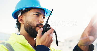 Buy stock photo Inspection, radio and man with engineering, feedback and property renovation with quality control. Helmet, outdoor and person with architecture, conversation and project management with safety check