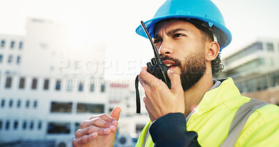Buy stock photo Man, engineer and talk on radio outdoor for discussion, planning and construction feedback. Male person, communication and tech for architecture, building update and information of project management