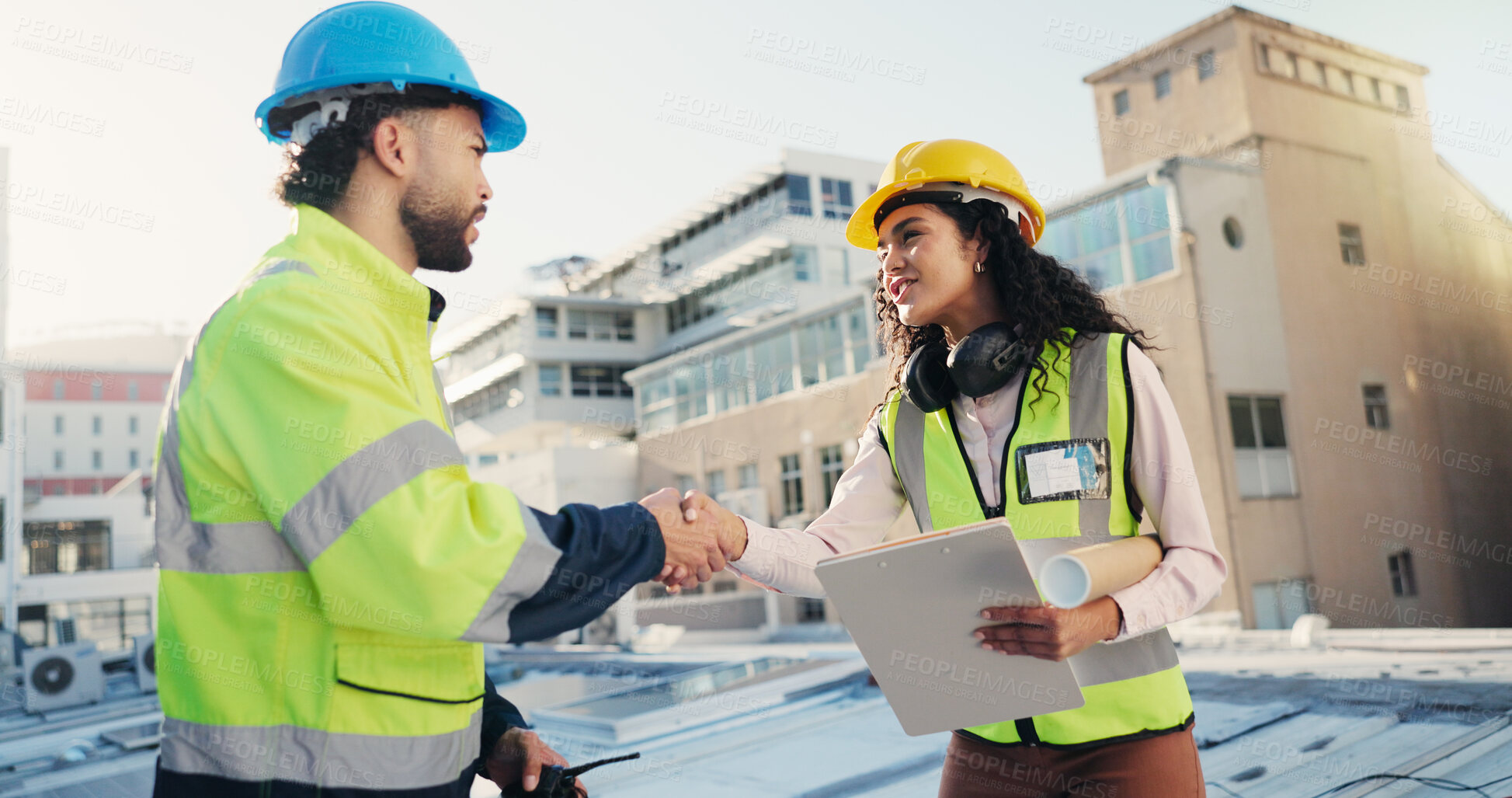 Buy stock photo Outdoor, engineer and team with blueprint, handshake and agreement for property development or city. Architecture, man and shaking hands with woman for construction, thank you and collaboration