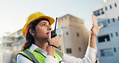 Buy stock photo Woman, engineer and explain on radio outdoor for discussion, planning and construction advice. Person, equipment and talking for architecture, building instructions or feedback for project management
