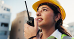 Construction site, woman and radio for communication with inspector outdoor in city for management. Engineer, update and manager speaking for building maintenance, project or architecture planning