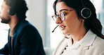 Business, woman and headset at call centre in office for customer service, faq and assistance. Female agent, coworking and mic for consultation, online advice and solution procedure with tech support