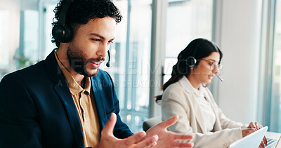 Buy stock photo Business, man and talk with headset at call centre for customer service, coworking and CRM. Male agent, laptop and explaining with solution FAQ, online advice and procedure for tech support in office