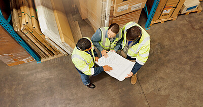 Buy stock photo Business people, contractor and above with blueprint for construction or floor plan at warehouse. Top view, employees or architects with document, paper or design for building schematics at storage