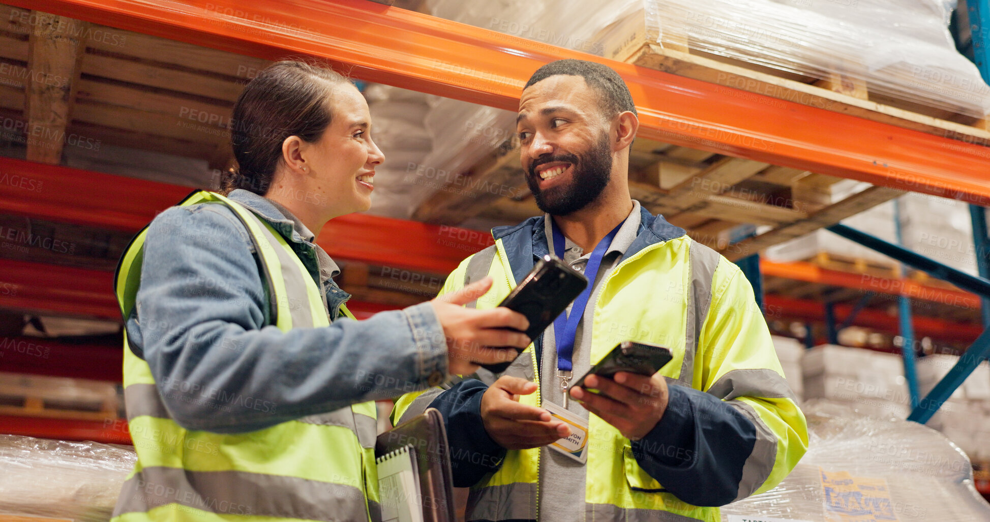 Buy stock photo Man, woman and phone at warehouse, logistics or happy for storage, talk or supply chain management. People, team and smartphone with smile for application, strategy and notification at shipping plant