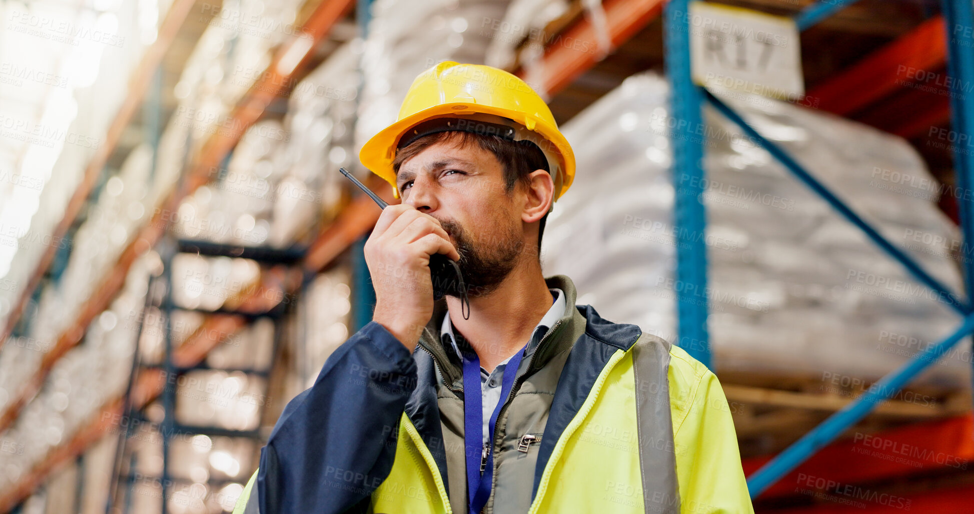 Buy stock photo Business, radio and man in factory, logistics and conversation with manufacturing. Person, warehouse and employee in workplace, helmet and discussion with industry, quality control and distribution