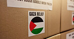 Shipping, Palestine and label with box in warehouse for logistics, food package and donation. Ngo distribution, gaza relief and humanitarian aid with cargo in factory for social responsibility