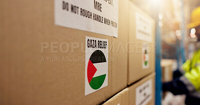 Buy stock photo Shipping, Palestine and charity with box in warehouse for logistics, food package and donation. Ngo distribution, gaza relief and humanitarian aid with cargo in factory for social responsibility