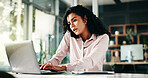 Business woman, laptop and multitasking with phone call at office for finance review or schedule. Female person, accountant or financial advisor talking on mobile smartphone for project or update