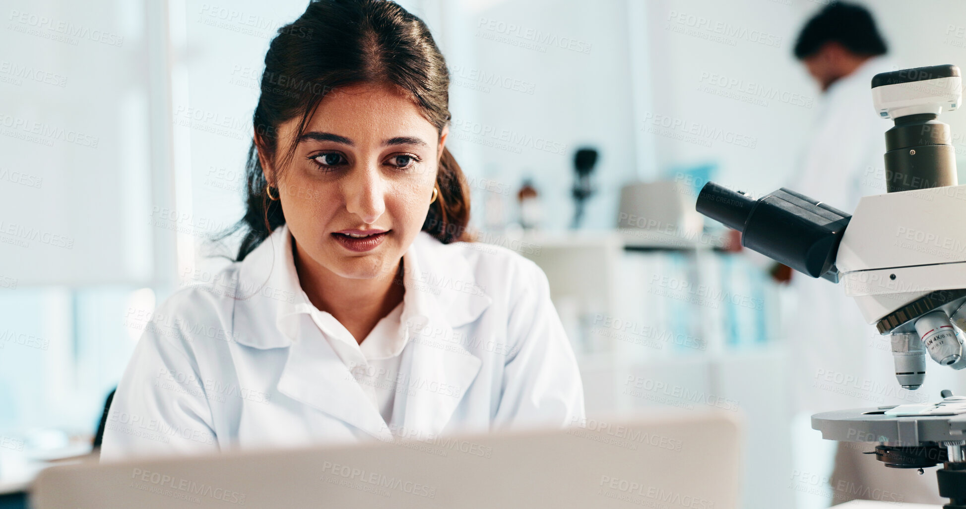 Buy stock photo Woman, scientist and reading on laptop in lab of research, study results and medical experiment. Female person, review or pc for project, biotechnology and discovery article of healthcare information
