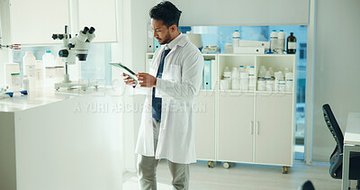Buy stock photo Man, scientist and tablet in laboratory with scroll, review and check report with medical research. Person, typing and tech with pharmaceutical study, vaccine development and application for feedback