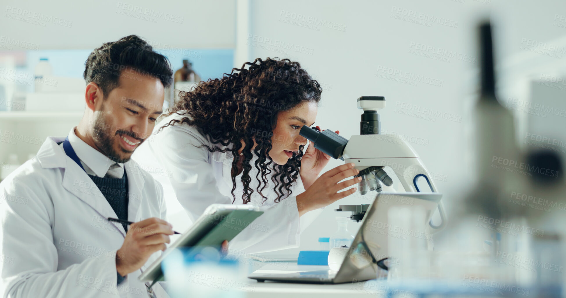 Buy stock photo Science, team and people on tablet in lab with microscope for research, medical study or DNA analysis. Healthcare, biology and man with woman on digital tech for forensic report, experiment or sample