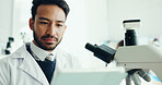 Science, tablet and man with microscope in lab for medical research, medicine study and online results. Healthcare, biology and scientist on digital tech for vaccine report, innovation and experiment