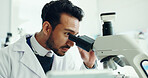 Scientist, research and man with microscope in lab for genetic testing, sample study and biology. Science, innovation and employee with medical equipment for DNA analysis, experiment and development