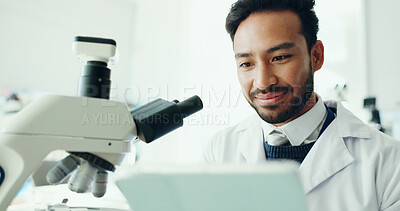 Buy stock photo Science, tablet and man with microscope in laboratory for medical research, study and online results. Healthcare, biology and scientist on digital tech for vaccine report, review and experiment
