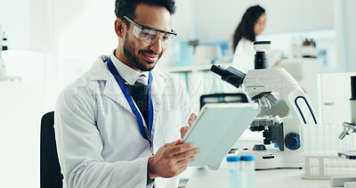 Buy stock photo Science, research and man in lab, tablet and online reading with app for experiment results. Person, medical scientist and employee in workplace, digital tech and data analytics with email for report