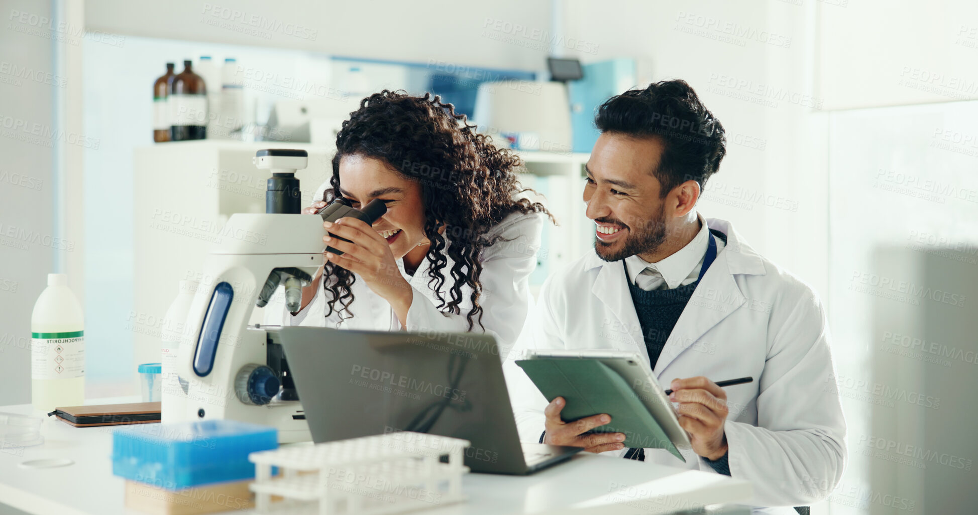 Buy stock photo Science, team and people on tablet with microscope for analysis, medical research and lab study. Happy, pharmaceutical and man with woman on digital tech for vaccine results, review and online report