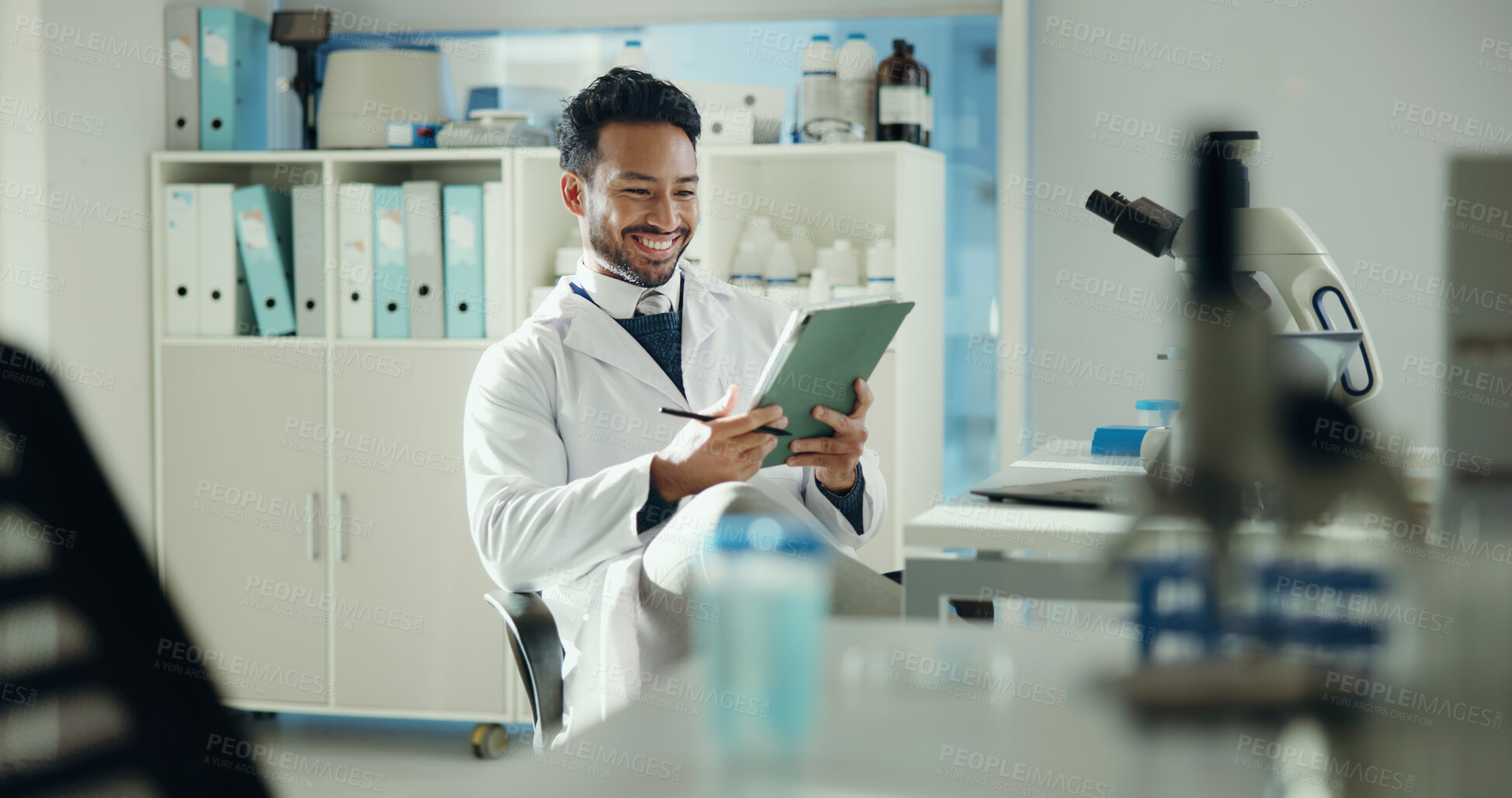 Buy stock photo Science, smile and man in lab, tablet and online reading with app for experiment review. Vaccine report, medical research and person in workplace, digital tech and study results with data analytics