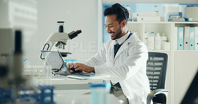 Buy stock photo Science, laptop and happy man with microscope in lab for medical research, medicine study and results. Healthcare, biology and scientist on digital tech for vaccine report, innovation and experiment
