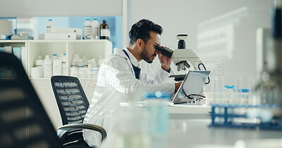 Buy stock photo Science, analysis and man with microscope in lab for sample testing, clinical trial and innovation. Scientist, employee and medical equipment for vaccine development, cancer research and drug study