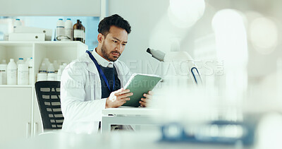 Buy stock photo Science, tablet and man with microscope in lab for medical research, medicine study and results. Healthcare, biology and scientist on digital tech for vaccine report, innovation and experiment