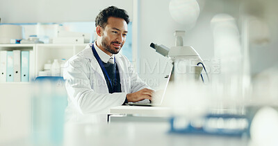 Buy stock photo Science, happy and man with laptop in lab for medical research, medicine study and results. Healthcare, microscope and scientist on computer for vaccine report, discovery and biology experiment